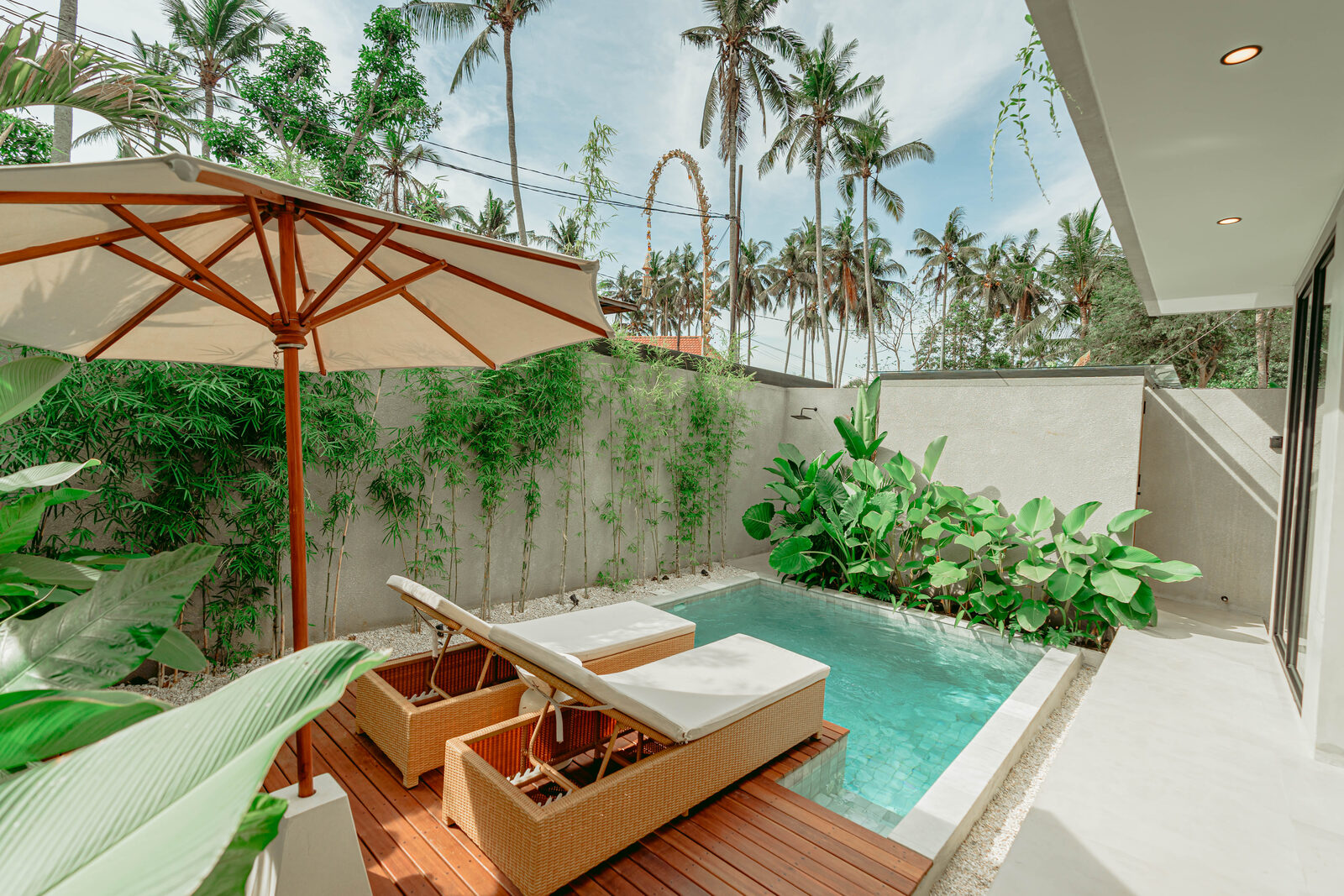 Private pool at Makai villa surrounded by tropical gardens